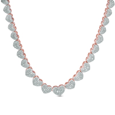 1/10 CT. T.W. Diamond Heart Necklace in Sterling Silver and 18K .
