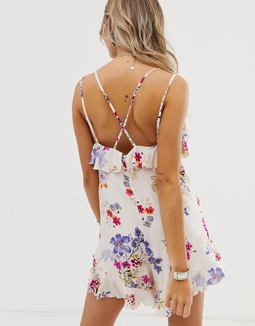En Creme floral playsuit with ruffle front detail | AS