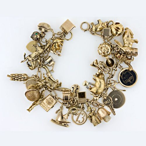 1940's Charm Bracelet. 14kt. Gold. I would die for this. So neat .