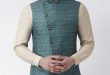 Digital Printed Cotton Linen Asymmetric Nehru Jacket in Dusty Blue .