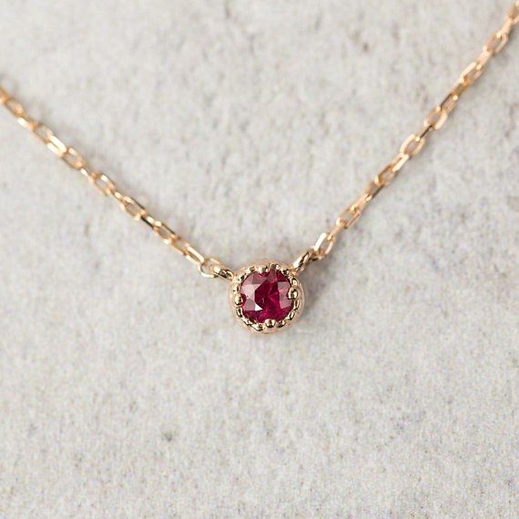 14k solid rose gold dahlia setting floating ruby necklace. This .
