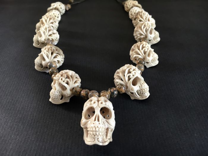 Hand carved SKULL necklace - deer horn / jasper gemstone beads .