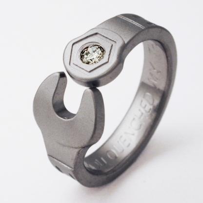 Enfield 1 titanium ring with wrenches | Titanium Wedding Rings .