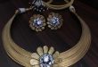 Gold Hand crafted fine stylish Trendy Jewellery Set for Women .