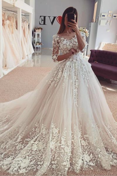 Beautiful Floral Lace Wedding Bridal Gown with Sleeves .