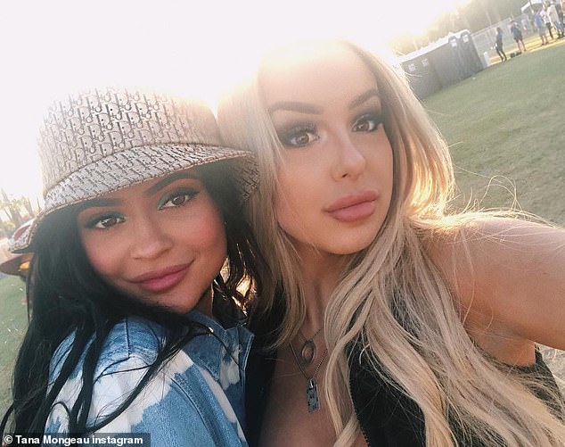 Kylie Jenner poses with Tana Mongeau at Coachella... while Tana's .